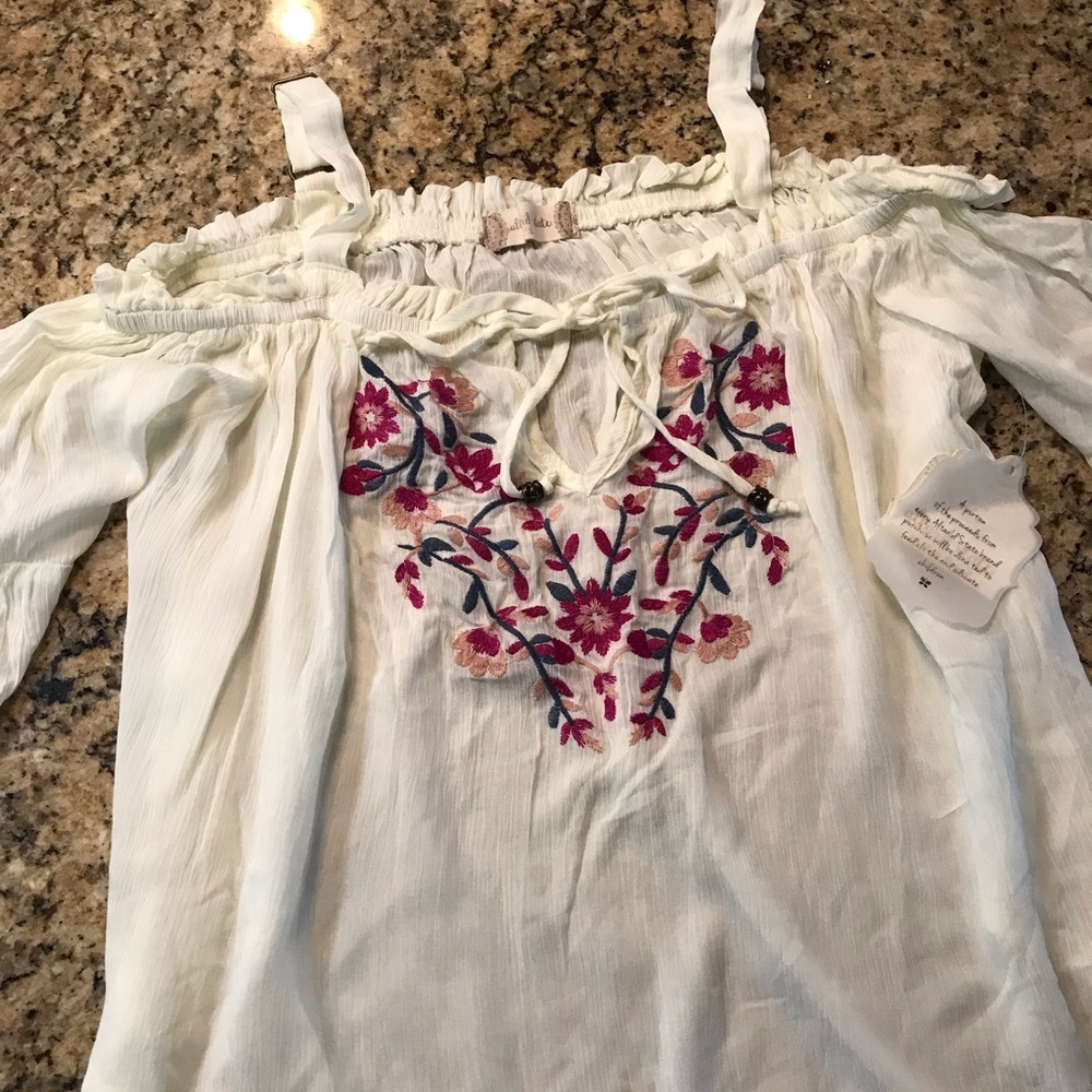 Light weight, off the shoulder airy top
